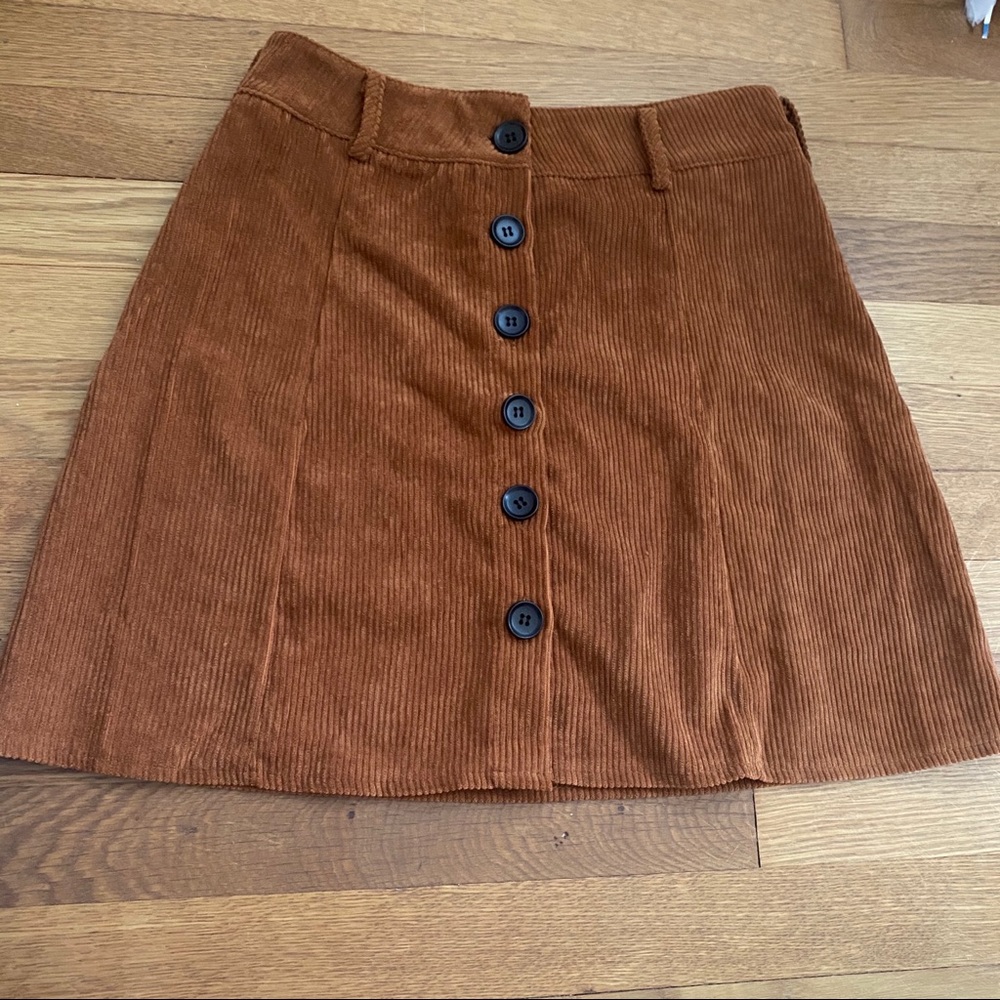 Brown skirt with black buttons